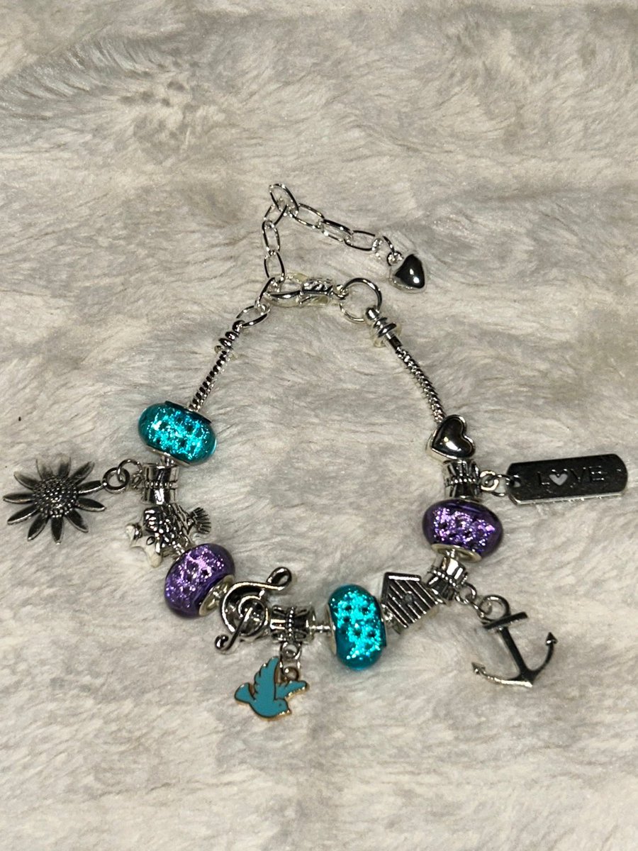 thomson_candace's tweet photo. Excited to share this item from my #etsy shop: Harry Styles inspired charm bracelet #music #harryshouse #pop  https://t.co/Sg8vN7IVOA https://t.co/DY4Bzme14F