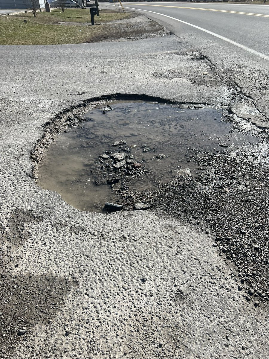 debbie_s_bender's tweet photo. @DollarGeneral I’m concerned about car-eating potholes on entrance drive to Store #16934 in Charleston, WV. They need repaired ASAP. Any plans? Other side of the entrance is getting one too. Soon, there will be no way for someone to avoid hitting them and damaging their car. https://t.co/SIV5t9TYyO