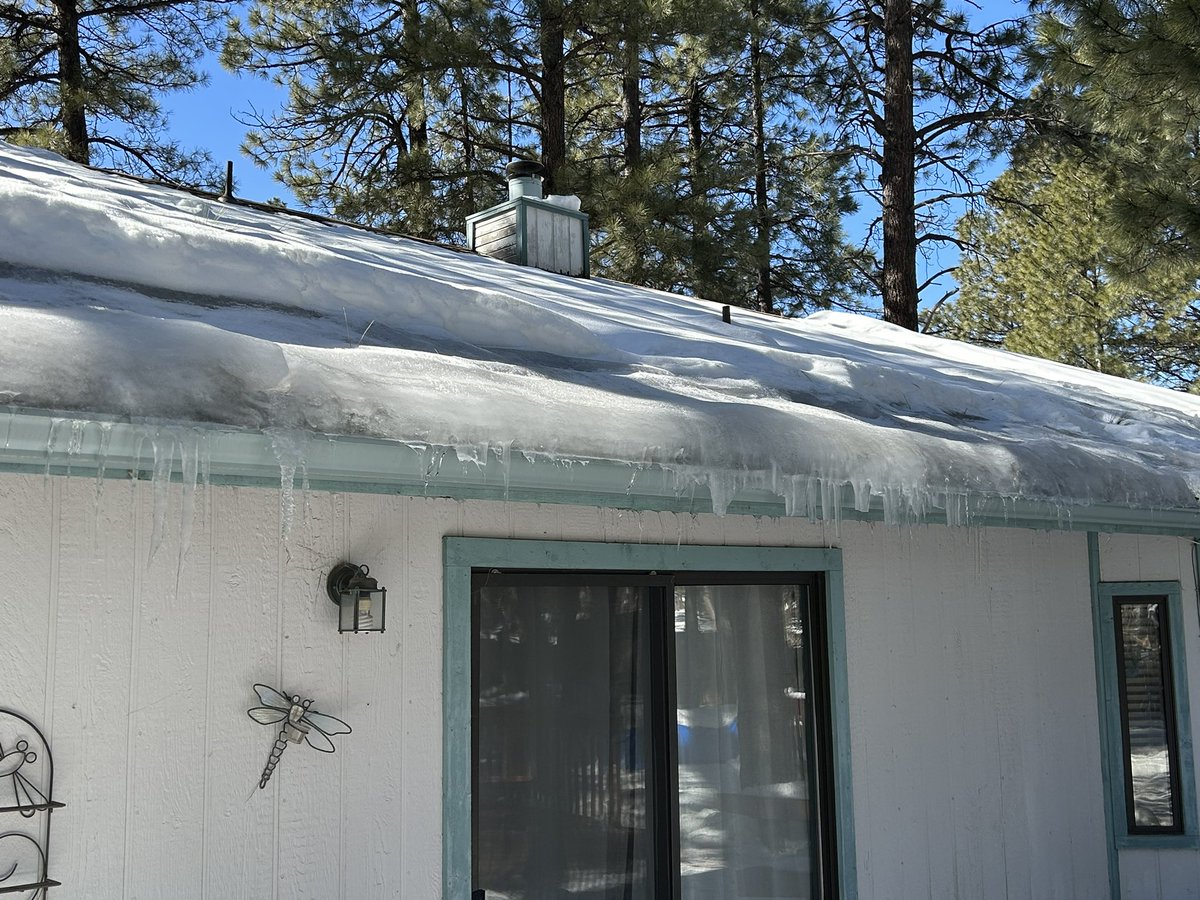 MikeRDzign's tweet photo. Left town for five weeks and came back to this: breaking up ice dams. #icedam #joysofwinter https://t.co/N0732AecuG