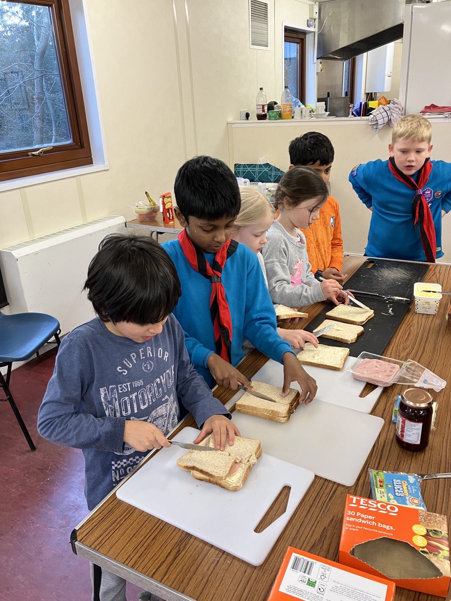 Beavers enjoy their food! Prepping veg, making sandwiches… &amp; trying real s’mores for the v 1st time!