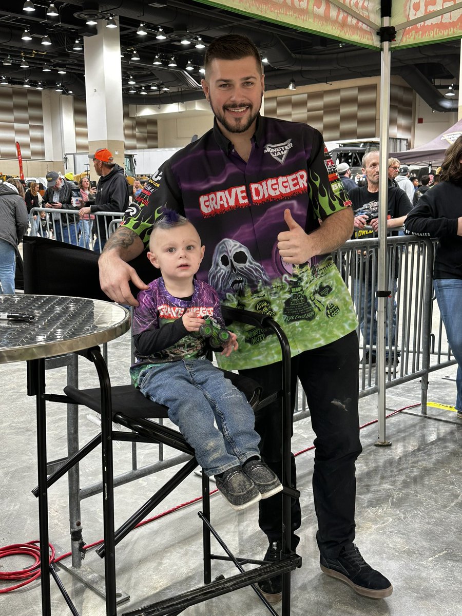 @MonsterJamEmerson with his purple hair getting to see the driver of Grave Digger  #MonsterJam