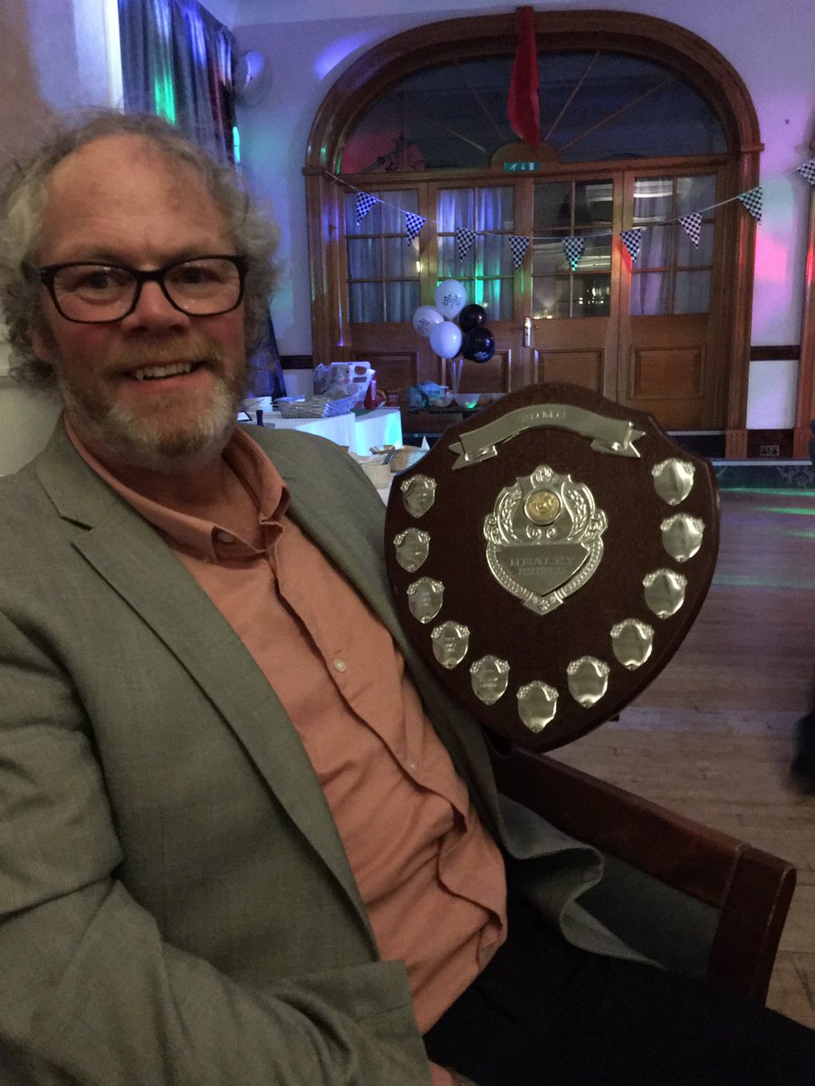 Andrew with the shield he was presented with tonight, for winning FTD( fastest time of the day) at a motor racing event,  held during the summer of 2022. Whilst driving his Pilbeam single seater racing car.