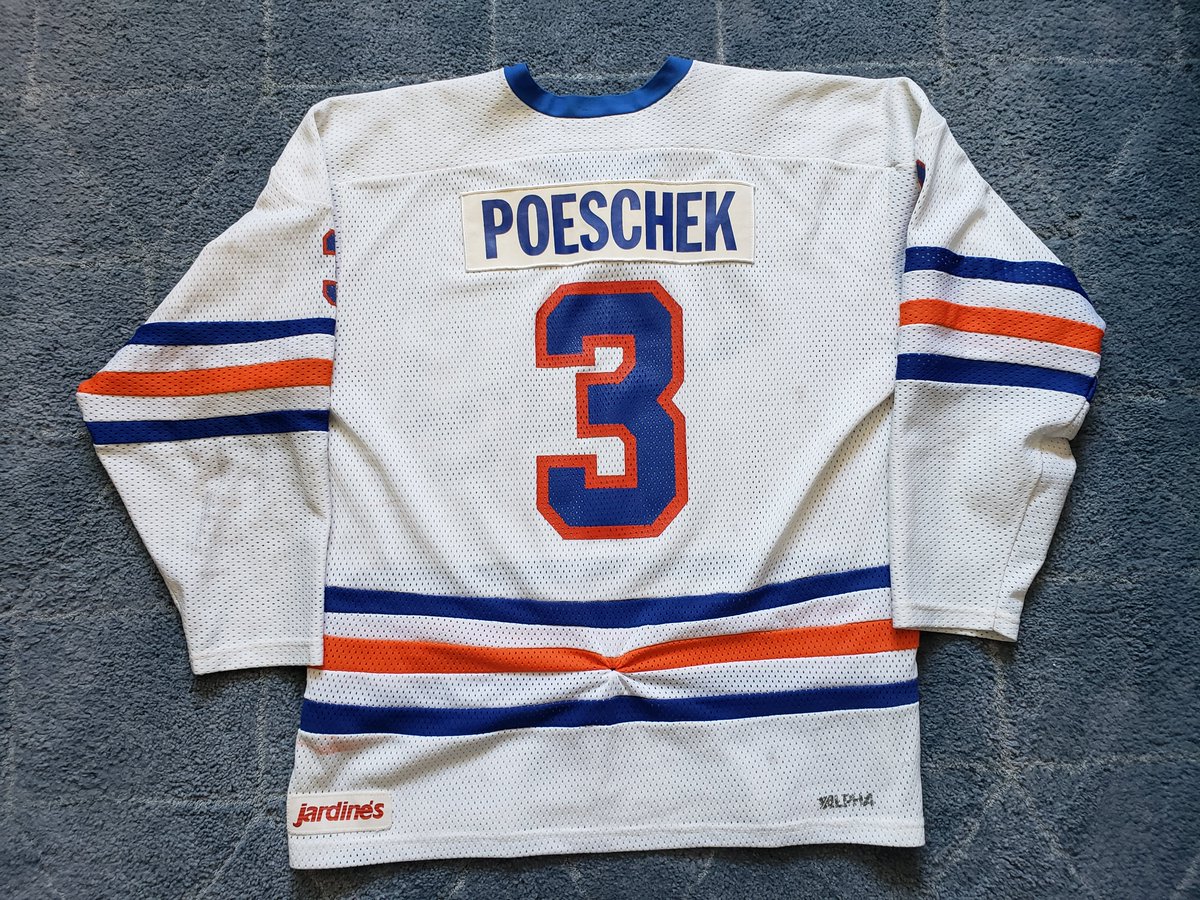 2RogueDubRacks's tweet photo. This week we go back to 1984-85 for this rare @blazerhockey 1st year home white worn by Enforcer Rudy Poeschek. Great wear and the coin and lace fightstrap are still intact.That quarter has been there since '85!! Honored to have this beauty on the Racks!! https://t.co/Xd0Ng1AZKJ
