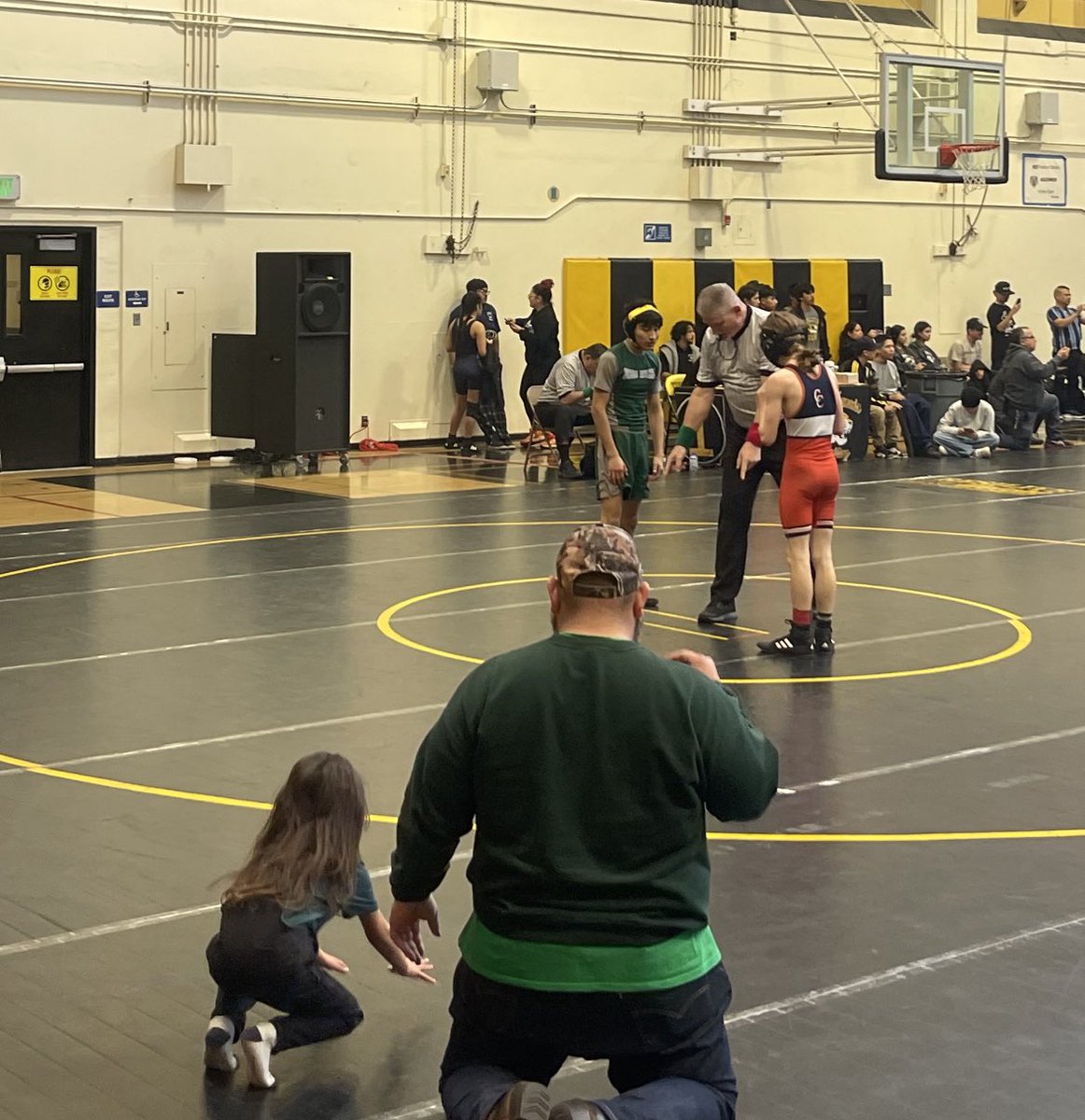 JoeSway08's tweet photo. My new favorite Assistant Coach. Best part is, she coaches for Pizza and Gatorade! #CIFWrestling #GoDogs https://t.co/hrCrW19FBC