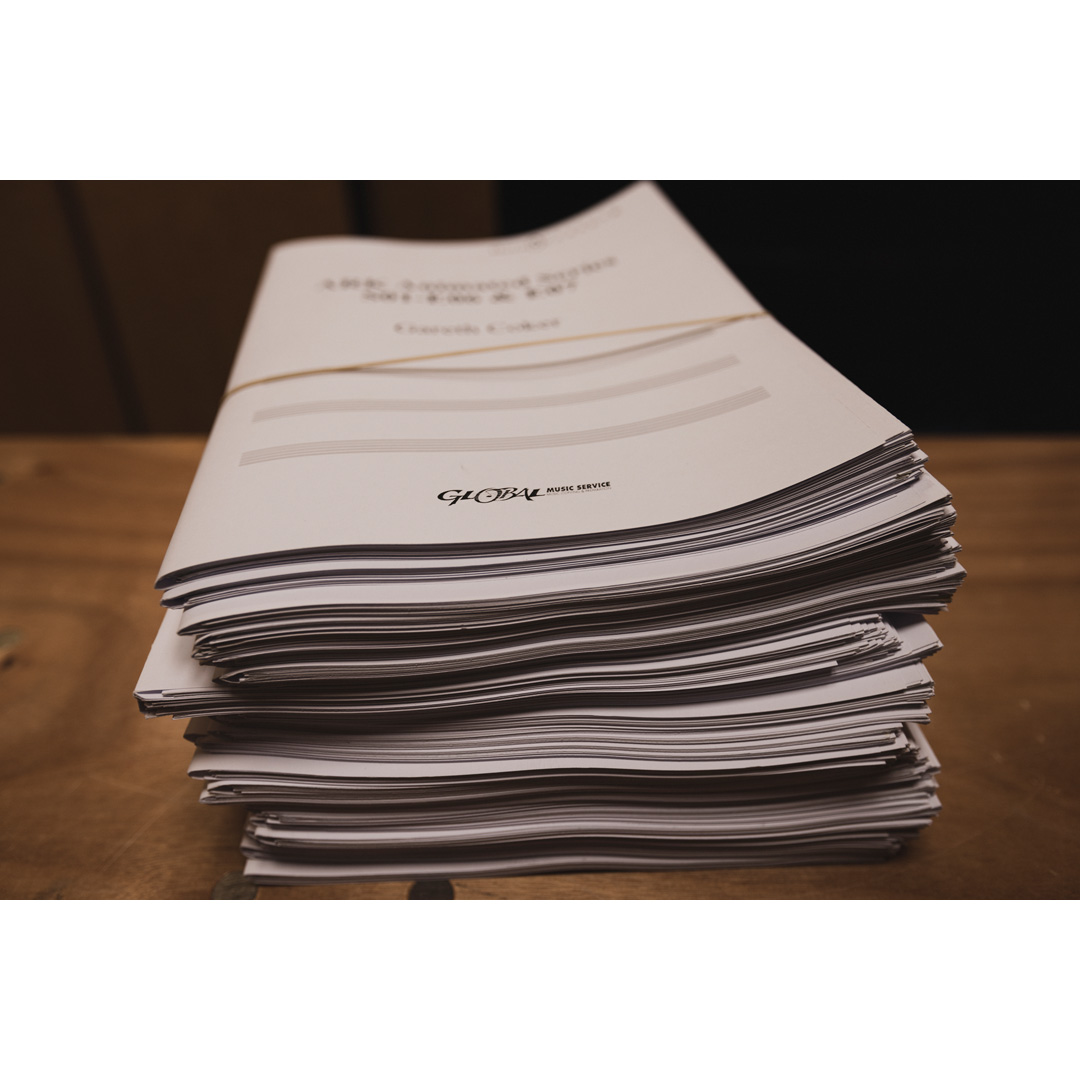 garethcoker's tweet photo. Yes. 1200 pages of score (on A3 paper), many thousands more of parts. Here's a tiny tiny fraction of it... (a set of parts for violins IIRC)

(Yes the paper is all recycled post-session, I hope we all move to electronic music stands that can be annotated by musicians soon...) https://t.co/8yccbUFKa2