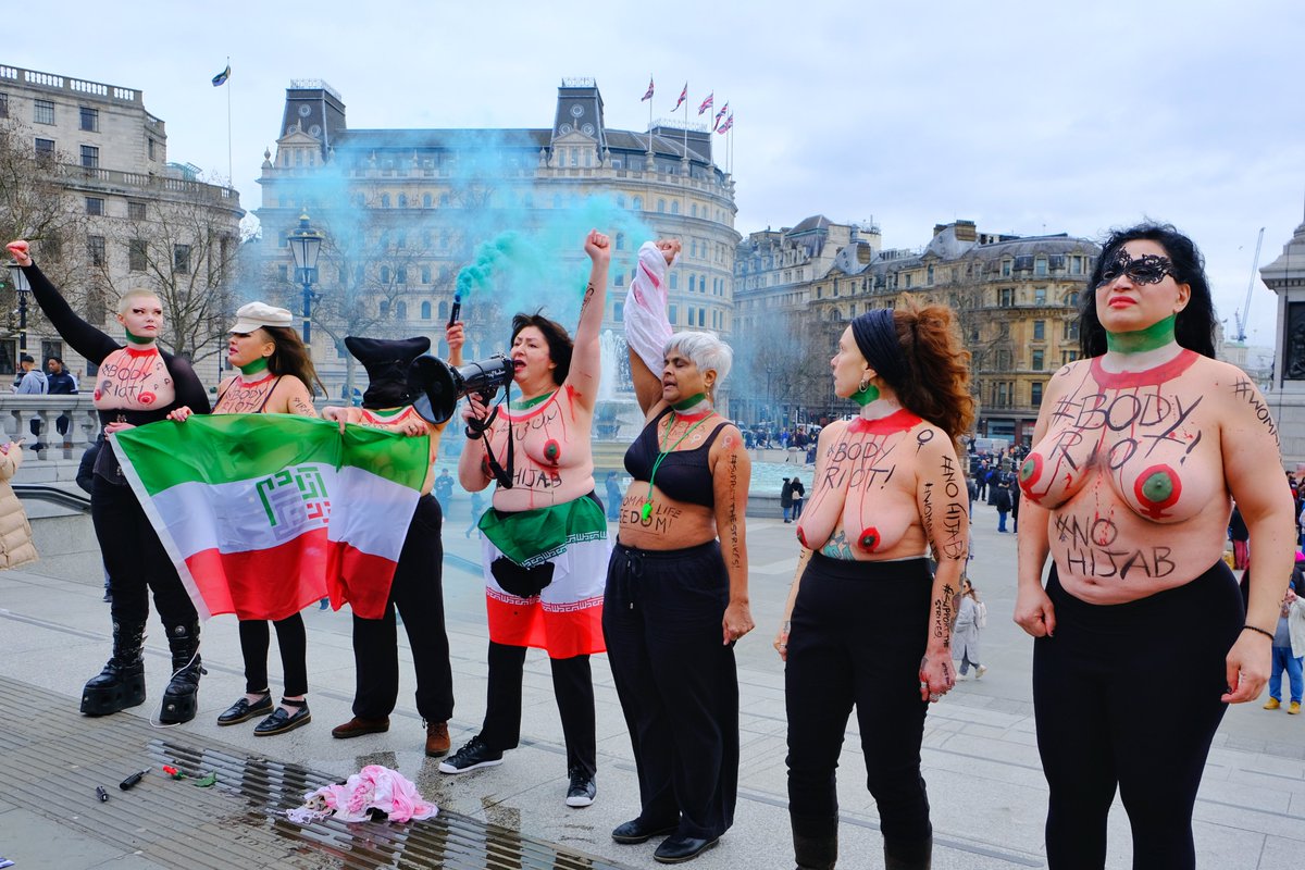 MaryamNamazie's tweet photo. On #HijabDay we said #No2Hijab #BodyRiot against religious &amp; patriarchal norms imposed on women and their bodies with sheer violence. In solidarity with #WomanLifeFreedom in #Iran. #MahsaAmini
@Femen_France @One_Law_for_All @CEMB_forum 
Photos by @EleventhHourPh1 https://t.co/4YHRosxJnb