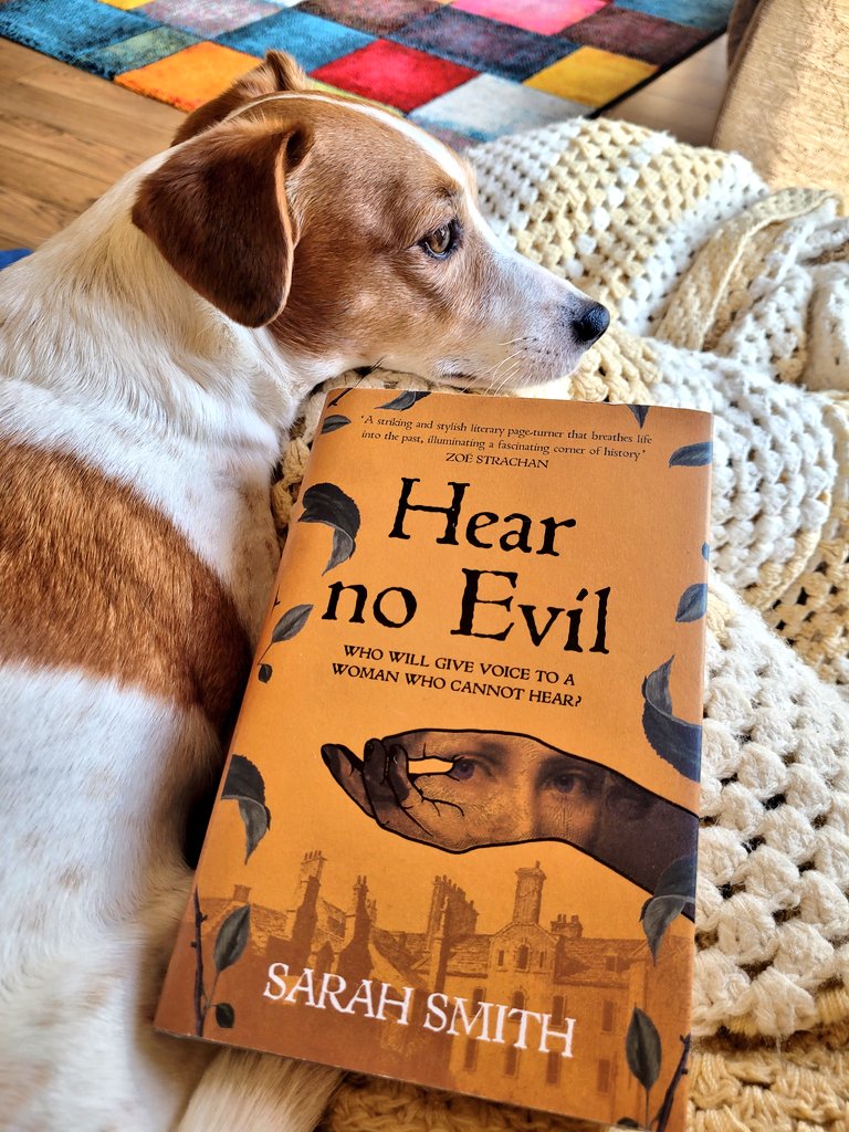 Not feeling well (🤧🤒) so Dolly and I are chilling with #HearnoEvil the first #scottishbookclub read of 2023. Based on a landmark case in Scottish legal history and set in Glasgow 1817, it follows the story of a young deaf woman striving to clear her name or face hanging. 📚💛
