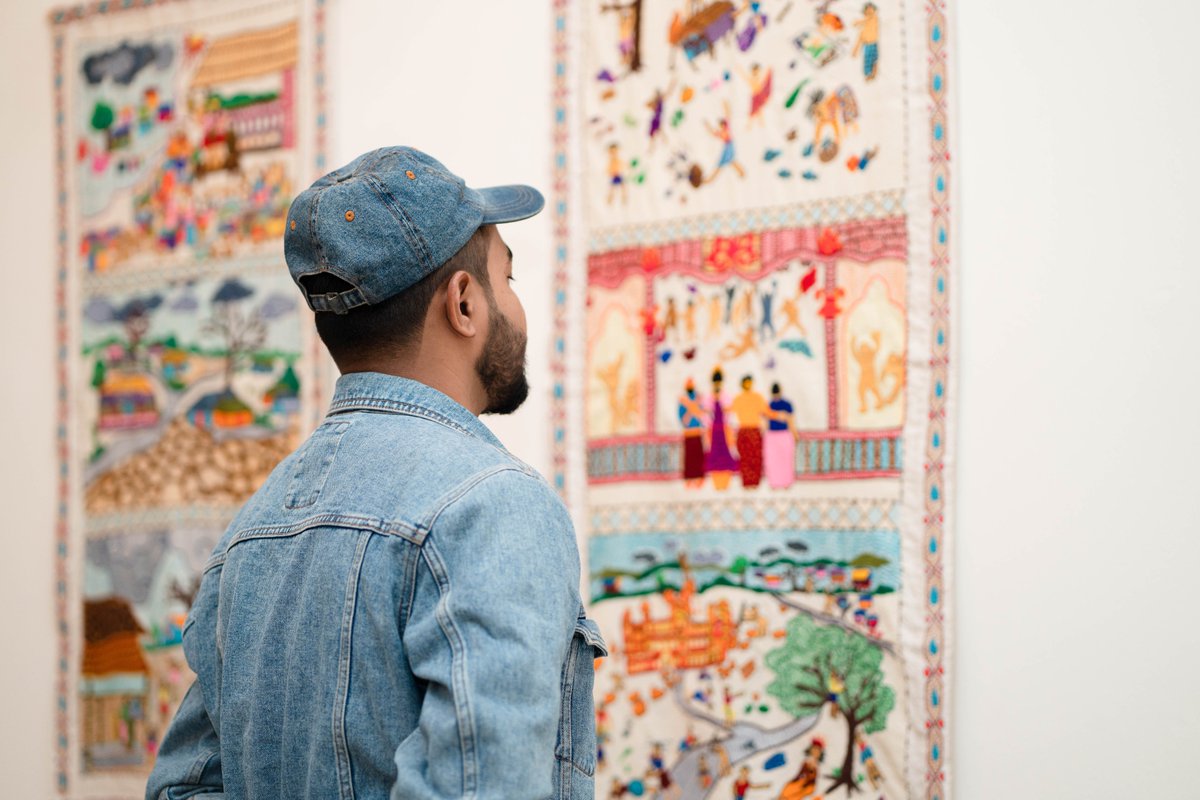 IOMBangladesh's tweet photo. Visitors were amazed at the stunning display of #Rohingya art, culture &amp; heritage 🎨🖼️💫 on the first three days of #DhakaArtSummit.
 
Get a glimpse into the rich &amp; vibrant culture of the Rohingya community in the @UNmigration-run Rohingya Cultural Memory Centre. Don't miss out! https://t.co/u4ClLPokOL