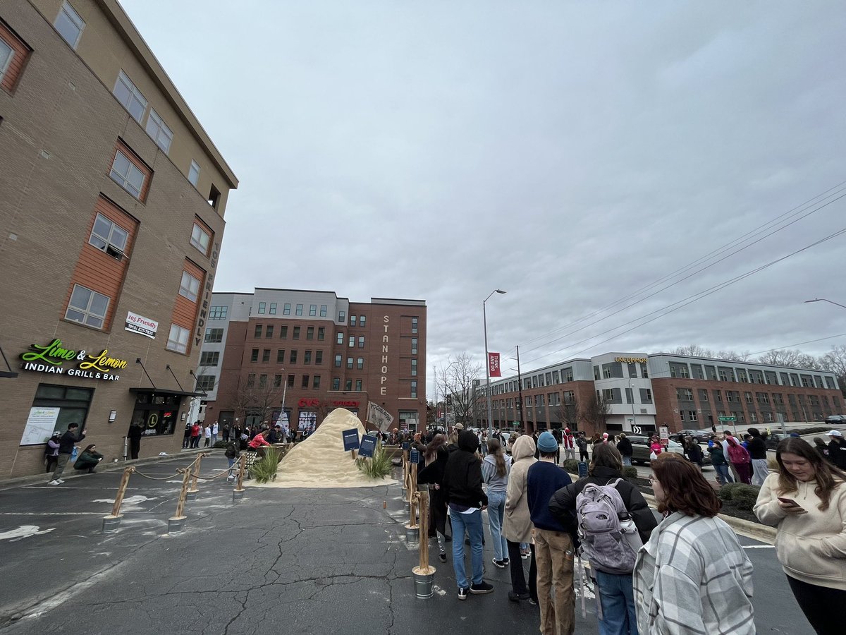 Can confirm they dumped a mound of sand in the Zaxby’s parking lot and a whole lot of people came to see it