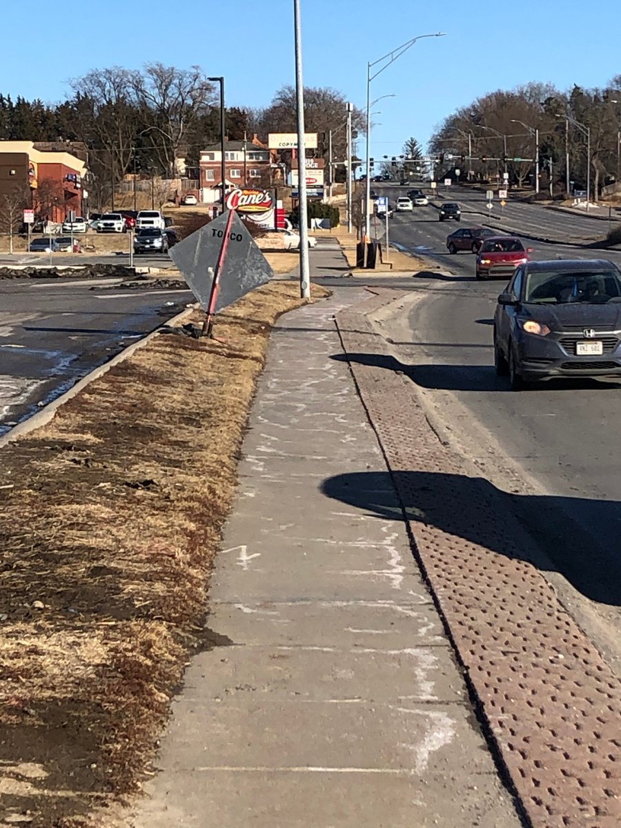 ctefft1's tweet photo. Whew! The sign has been moved. The sidewalk transportation system is up and running again. Thanks, @omahapublicwrks #safesidewalks https://t.co/jduedNDdWU
