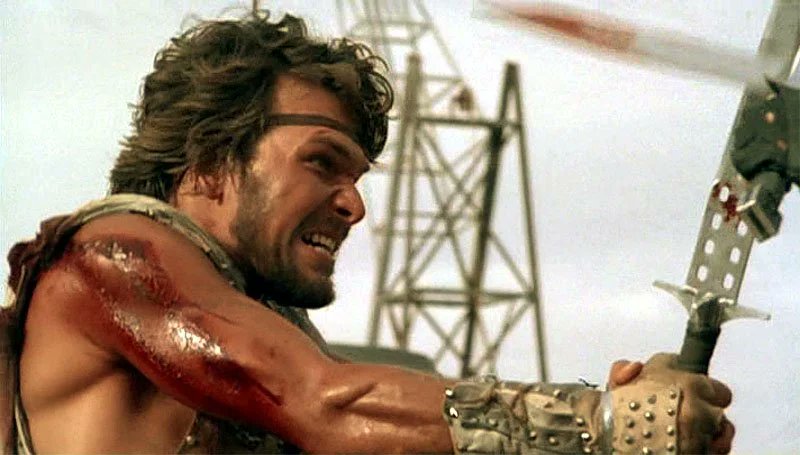 RanesHook's tweet image. This year's #NoFootballNoProblem is a true "cut" above the rest with STEEL DAWN! Wandering swordsman #PatrickSwayze isn't having "the time of his life" after the apocalypse. But he'll make damn sure to slice an' dice the opposing team in itty bitty pieces! youtube.com/watch?v=uhqY4N…