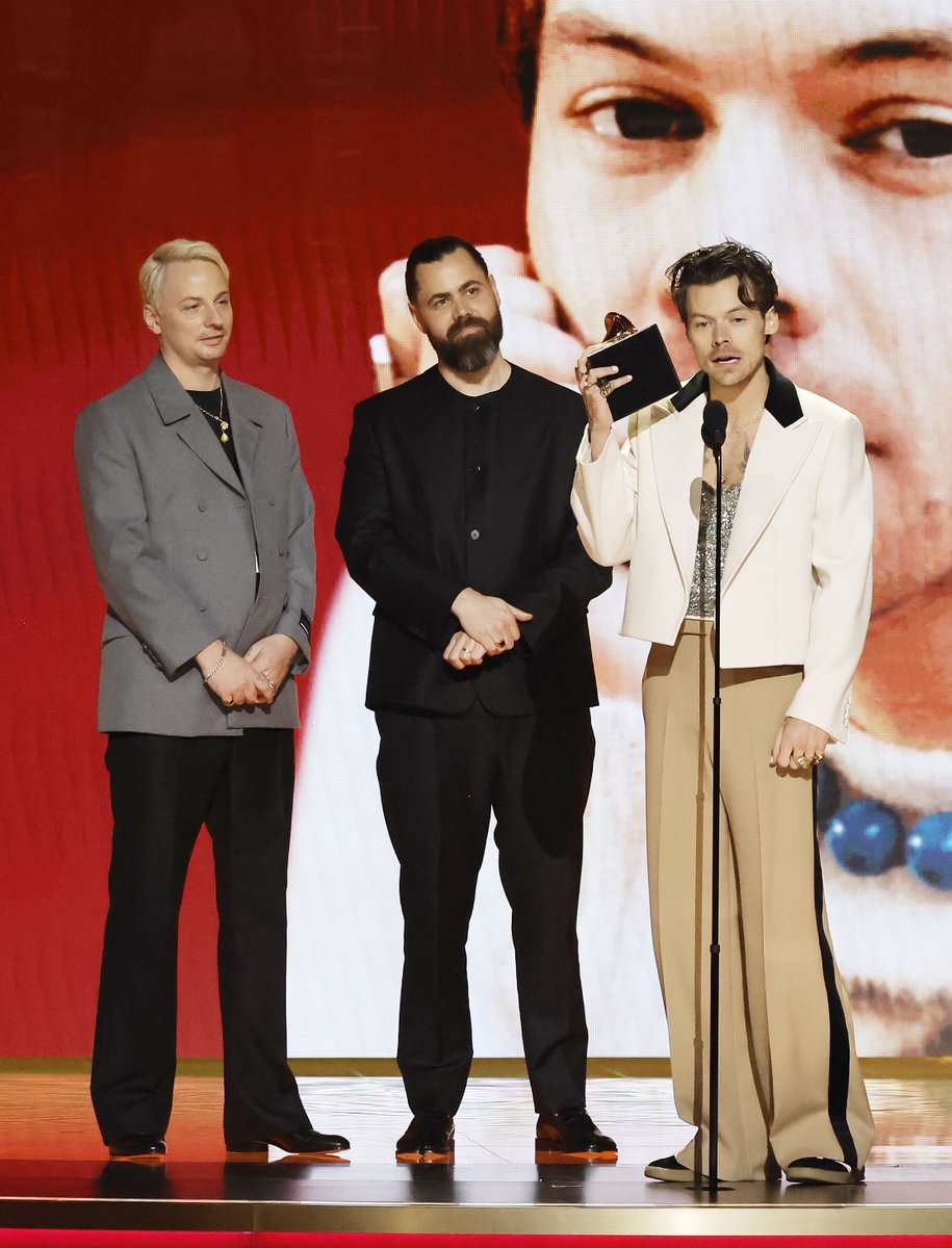 hsdcandids's tweet photo. Harry, Kid and Tyler accepting the Best Pop Vocal Album award for “Harry's House” onstage at the 65th #GRAMMYs  in Los Angeles, California. https://t.co/mKsLDyyRKs