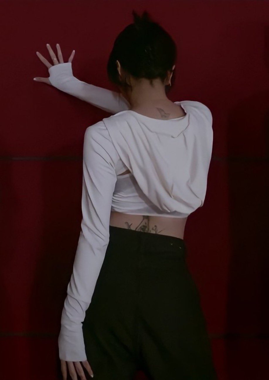 A naked woman with a leash TWICE Chaeyong flaunted a new risqué tattoo