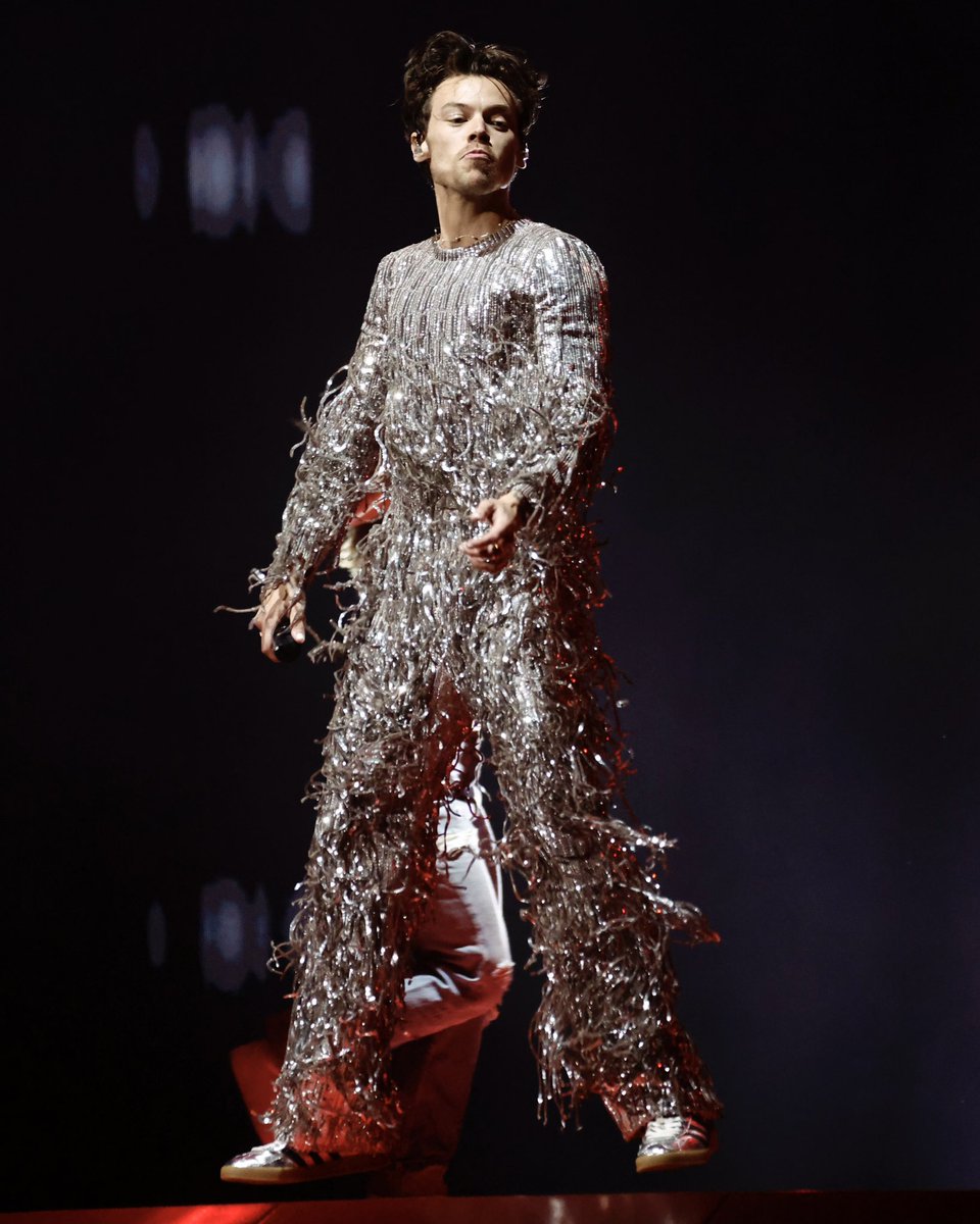 Harry Styles performing in silver Adidas Gazelles at the #GRAMMYs