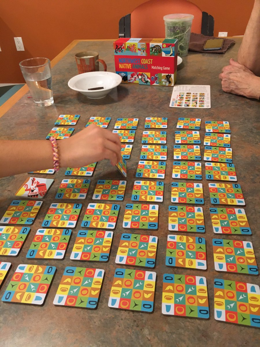 sky_yyc's tweet photo. After supper in the #commonhouse this eve - neighbours shuffling the memory game before competitive play. #loudandfun #cohousing and #connection https://t.co/KJjCtRkYKy