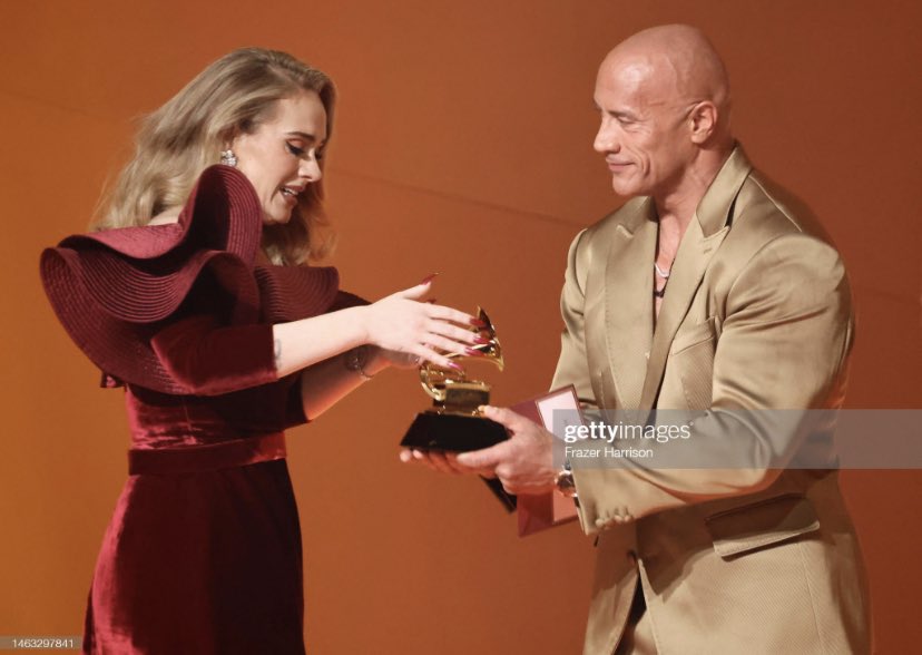 Cover2CoverHU's tweet photo. “Get up here bestie!” The Rock and Adele’s friendship >> #Grammys https://t.co/rXQnim1YVp
