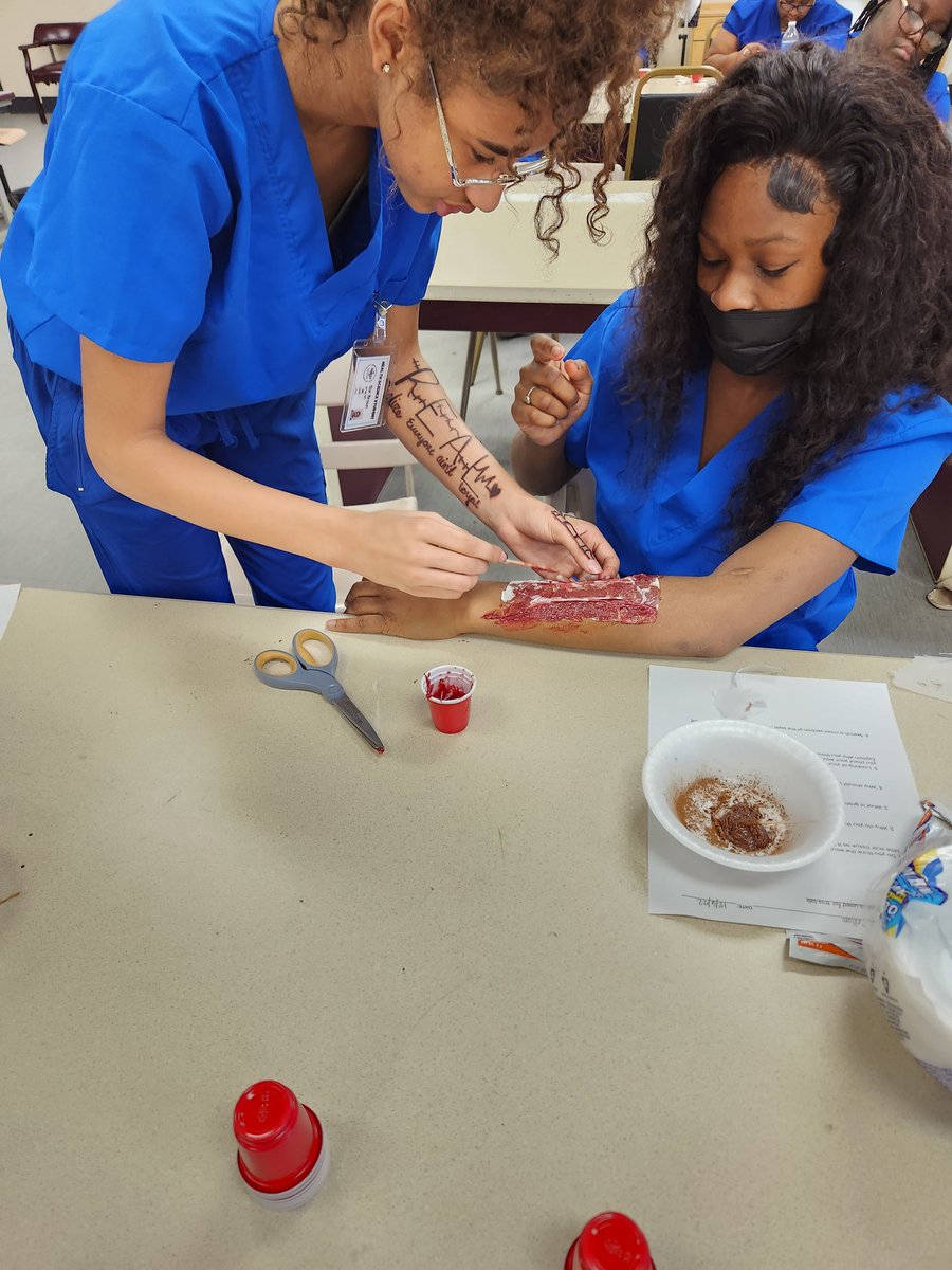 HealthMasd's tweet image. Health Science students working on an Integumentary system activity.