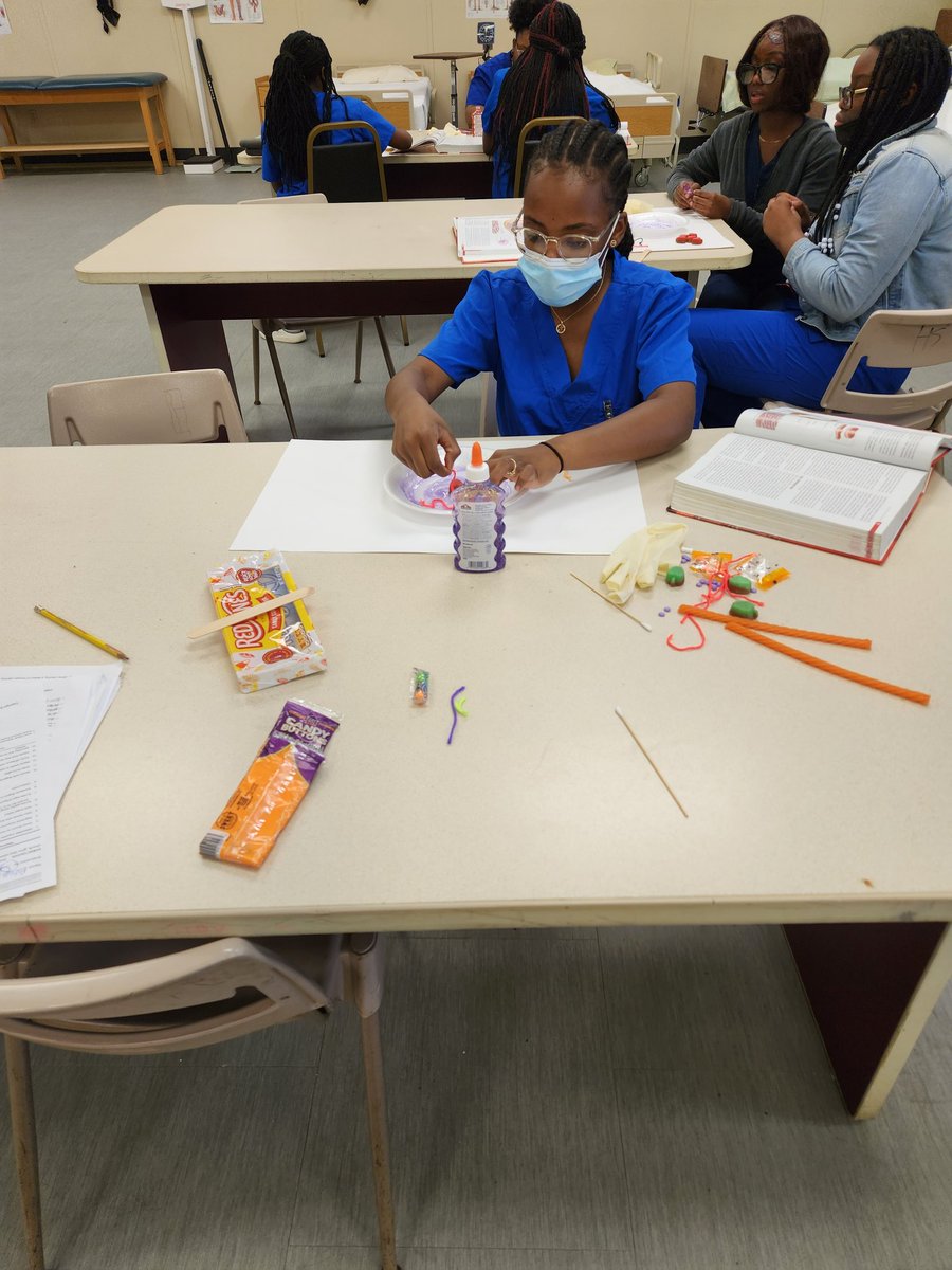 HealthMasd's tweet image. Health Science students created cells using glitter glue and candy!