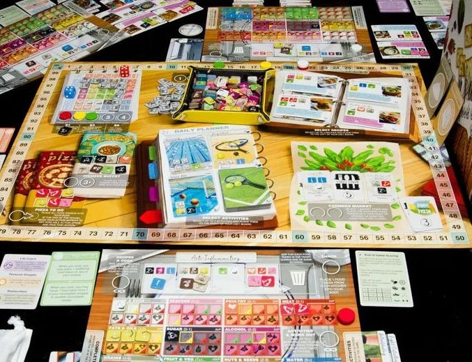 BoardGamerSteph's tweet photo. Consumption is a thematic food game from @kolossalgames. You have to manage all your food intake and balance your diet accordingly. Super nrat game and not as challenging as it looks. There are just a lot of tokens! #consumption #kolossalgames #bgg #Allthegames #newgames #fo… https://t.co/r1UqUlZAdi