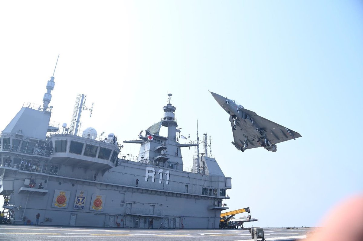 livefist's tweet photo. BREAKING: An LCA Navy has just made its maiden landing and take-off from aircraft carrier INS Vikrant. First photos: https://t.co/363KTOg6YW