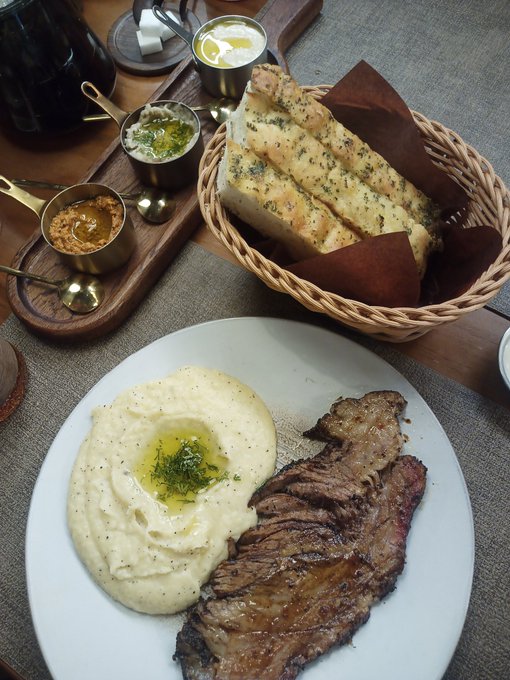 Late lunch at a Tex-Med (Texas-Mediterranean) restaurant. Brisket and mashed potatoes, eggplant, walnut