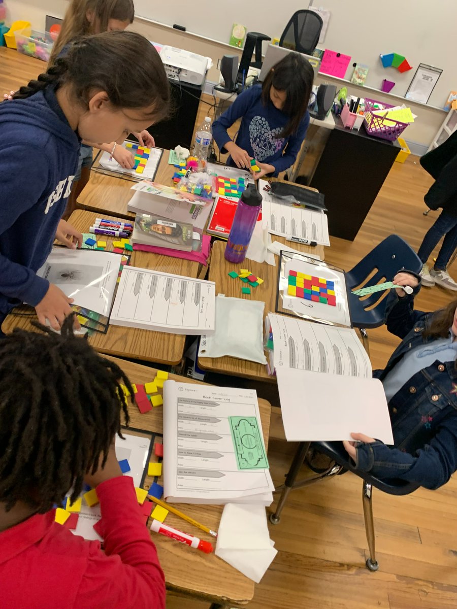 Ms. Rodriguez's 3rd grade class at @HCPSWestShoreES exploring the area of rectangles with color tiles! #MTRChallenge