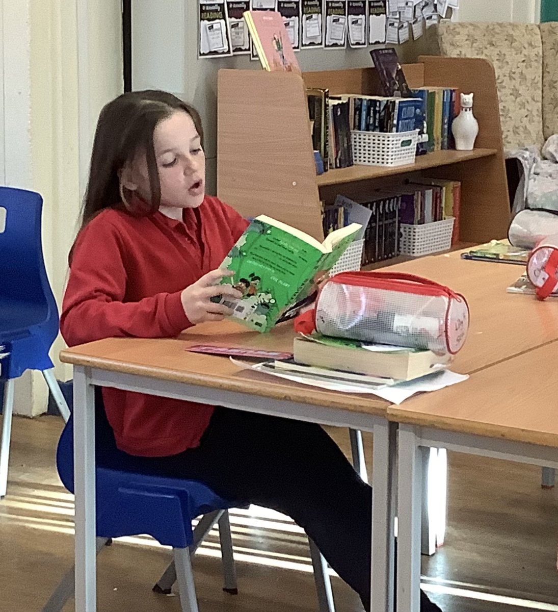 HGPAMrsW's tweet photo. What a treat, Lily is reading our class Reading Canon book to us! #littlebadman @PenguinUKBooks #harrowgateacademy #harrowgateenglish https://t.co/H16ytSijog