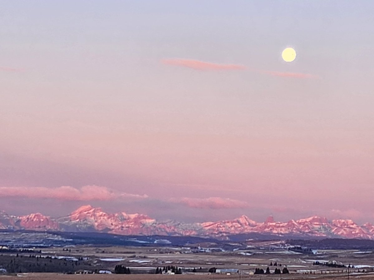 Snow moon. Nice morning here in Cochrane, Alberta.