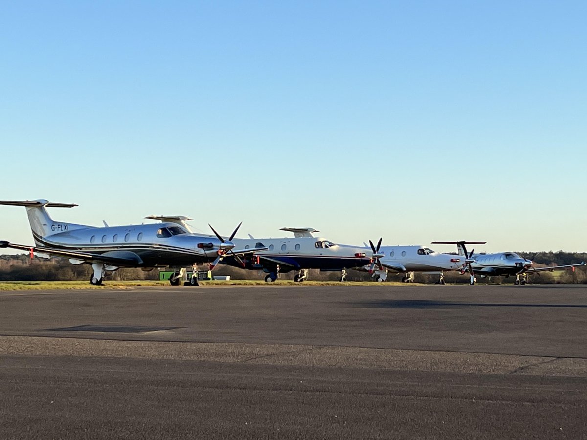 We love where we work at Fairoaks Airport #EGTF.  We are always spoilt with lots of <a href="/PilatusAircraft/">Pilatus Aircraft Ltd</a> #PC12s around (there are three more to the right facing this line of 4, and another visited earlier from #Ravenair

#SingleLife <a href="/SETOps2023/">SETOps Conference</a>
