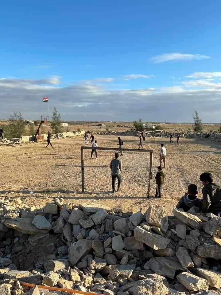 Sinaifhr's tweet photo. Photo of the day: An attempt to capture a moment of normal life. A football match in the village of Mahdia in #Rafah, eastern #Sinai https://t.co/54cU9VbP3k