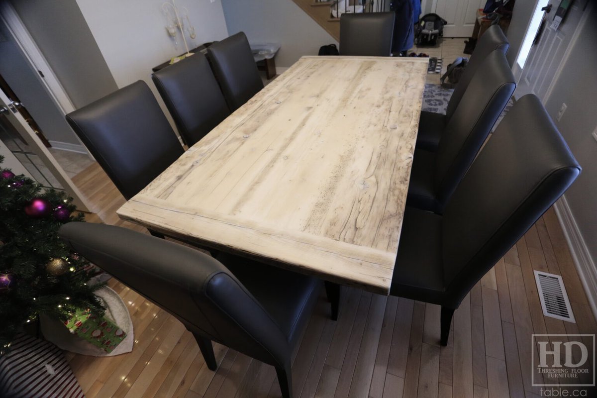 7′ Reclaimed Ontario Barnwood Table we made for a Niagara Falls home – Plank Base – Old Growth Hemlock Threshing Floor Construction – Original edges & distressing – epoxy + matte polyurethane finish – Bleached Option – 8 Topgrain Leather Parsons Chairs – table.ca