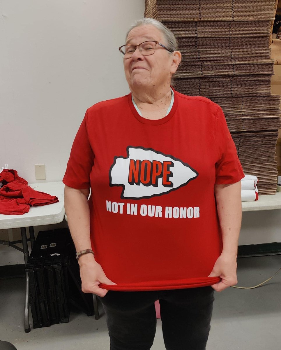 SimonMoyaSmith's tweet photo. Nope. Not in our honor.

These shirts are available through the Kansas City Indian Center: https://t.co/GkUA0wlKB1. 

You can also sign the petition to change the name here: https://t.co/rnITj3MvTN

We are not mascots. https://t.co/mJOx20gSDt