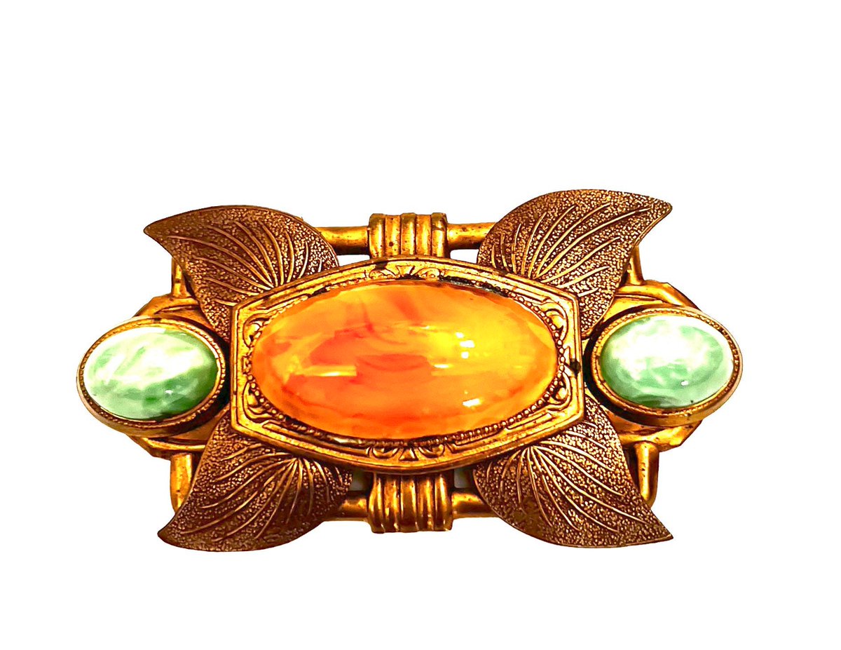 VintageImagine's tweet image. Art Deco Stamped Brass &amp;amp; Glass Brooch Textured Brass Leaves Orange Oval Center Stone Peking Glass Cabs Gift for Her #TexturedSurface #BrassMount 
$75.00
➤ etsy.com/listing/137217…