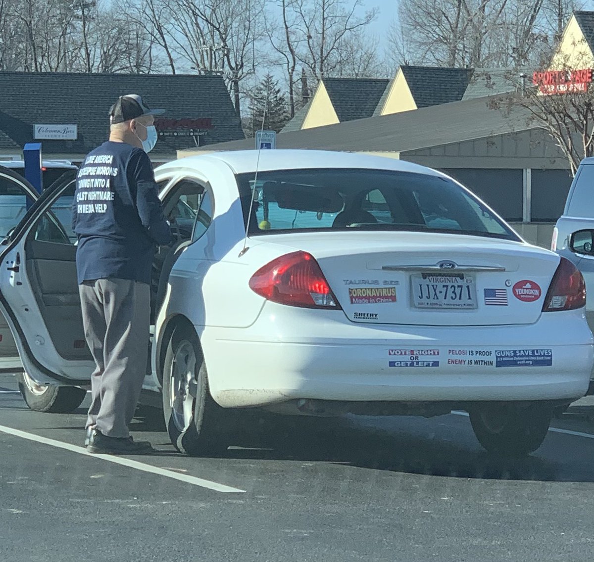 Boomer prints Facebook post on shirt: