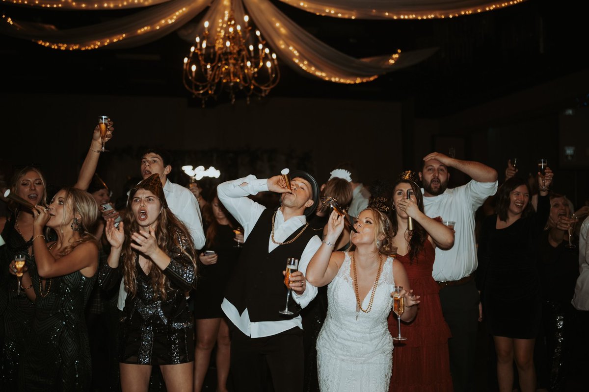 When the game deciding field-goal and ball drop happen within seconds of eachother on your wedding night… the show must go on