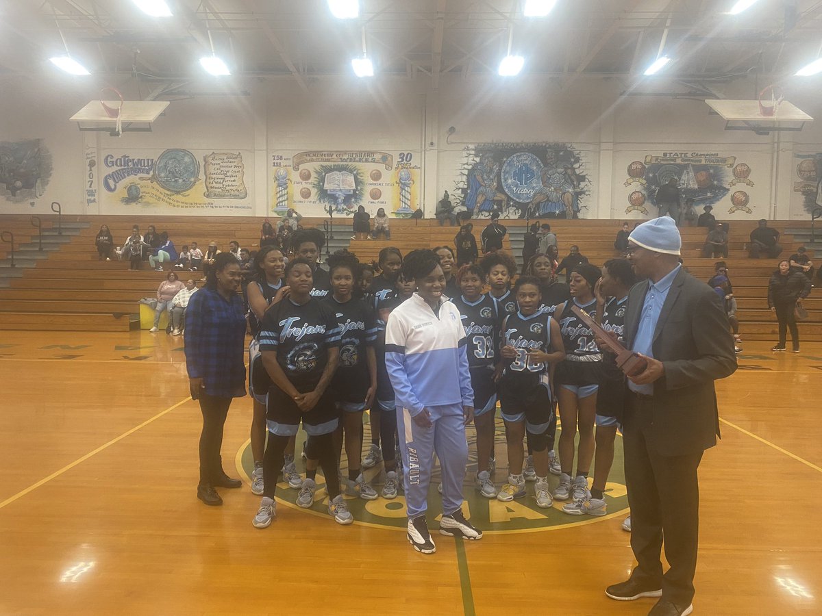 ribault_ad's tweet photo. Principal Dr. Gregory D. Bostic presenting the #Ribault Lady Trojans with their 1.2.3.4…..too many to count District Championship. On to the State Regional Quarterfinals vs. Jackson at #Ribault on Thursday at 7pm. #FloridasPremierGirlsBasketballProgram #ExcellenceNeverGraduates https://t.co/yEBfiNZM3L