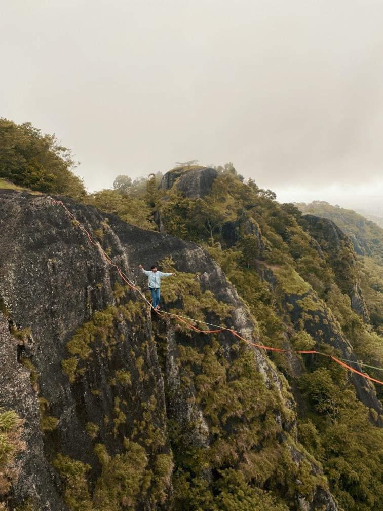 Balancing On Grizzly Outdoor Wear