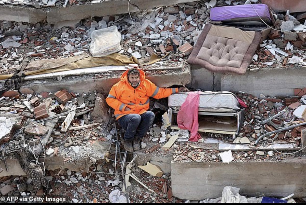 My god.. this picture is so utterly heart-breaking. A Turkish father, Mesut Hancer, holding the hand of his dead 15yr-old daughter in the rubble of a building crushed by the earthquake. Devastating.