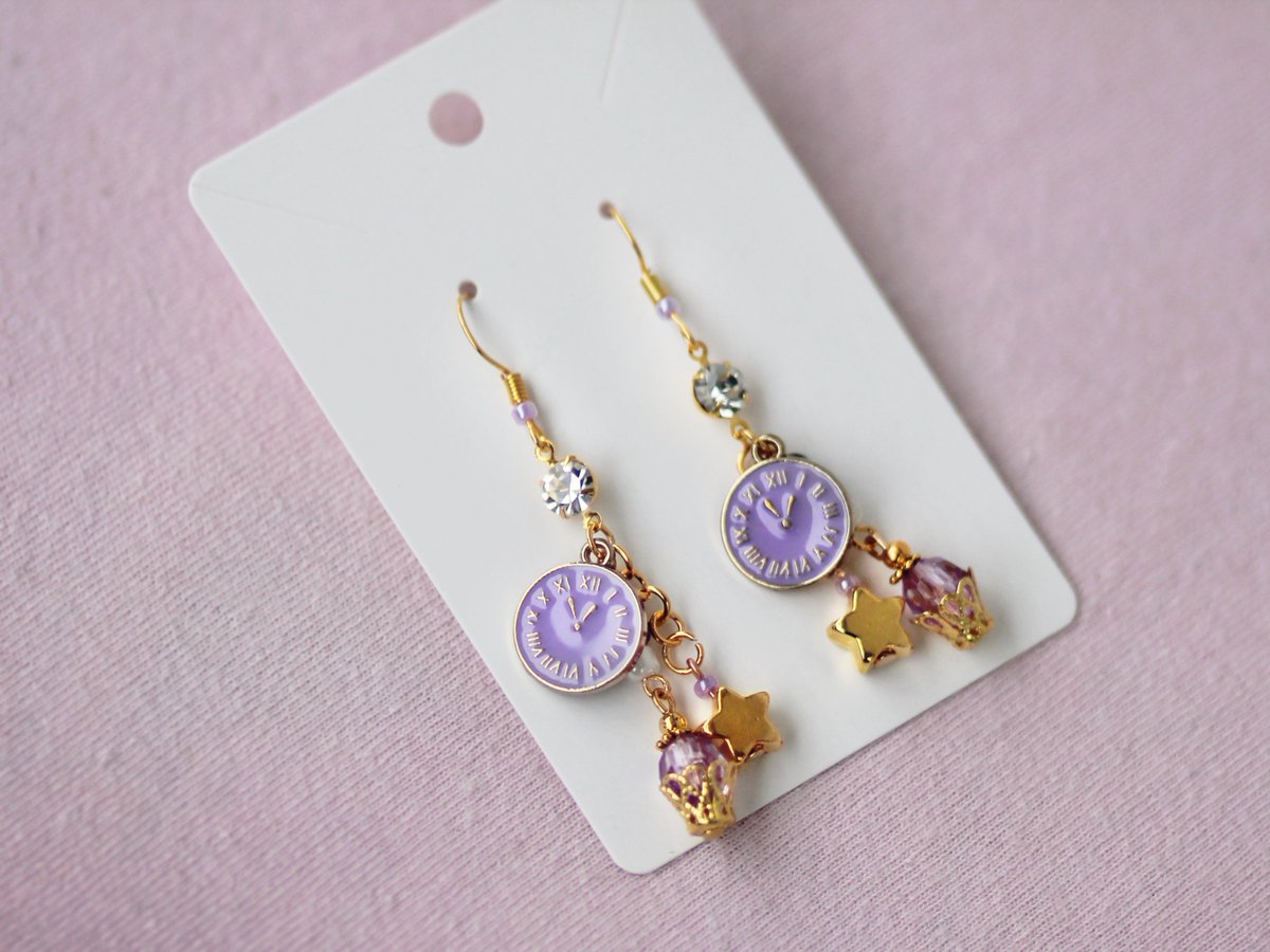 slothberrycraft's tweet photo. would you wear the madoka themed earrings, or the homura? or maybe both???🎀💖⌛ 
#madokamagica #puellamagimadoka #madokakaname #homuraakemi #まどマギ #handmadejewelry https://t.co/7W5hAS03Oo