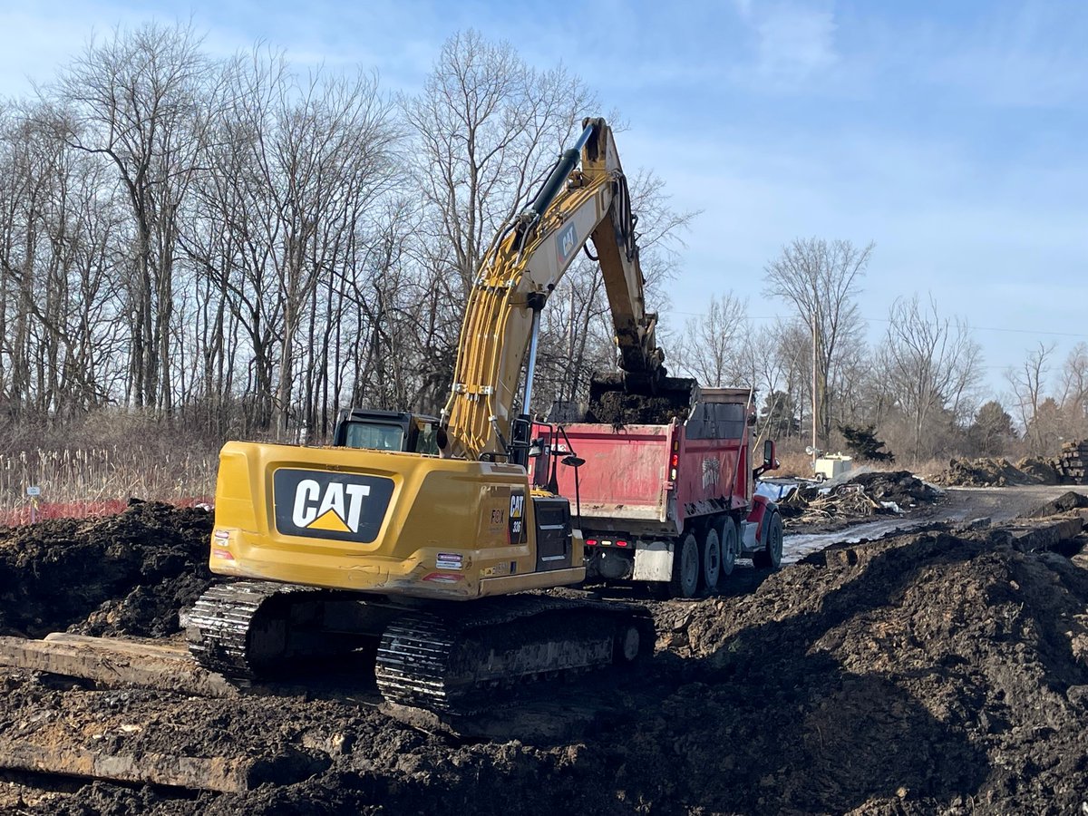 INDOTNortheast's tweet photo. Here's a look behind the barrier at the work happening on the U.S. 20 widening project in Elkhart Co. Crews have been hard at work removing the peat soil, which is unsuitable to build a roadway on top up, and backfilling it with sand. #NextLevelRoads https://t.co/MNhvhrsRh7 https://t.co/eDSuXLqROw