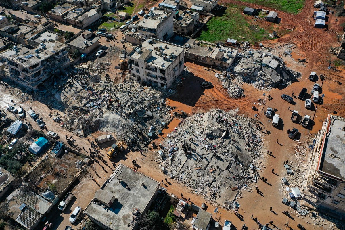 AKMcKeever's tweet photo. Aerial images of collapsed building in the western nieghborhood 

1. 36.396987, 36.685053
2. 36.395318, 36.686681

https://t.co/74gpoXhcB3 https://t.co/QpxzgGTKQR