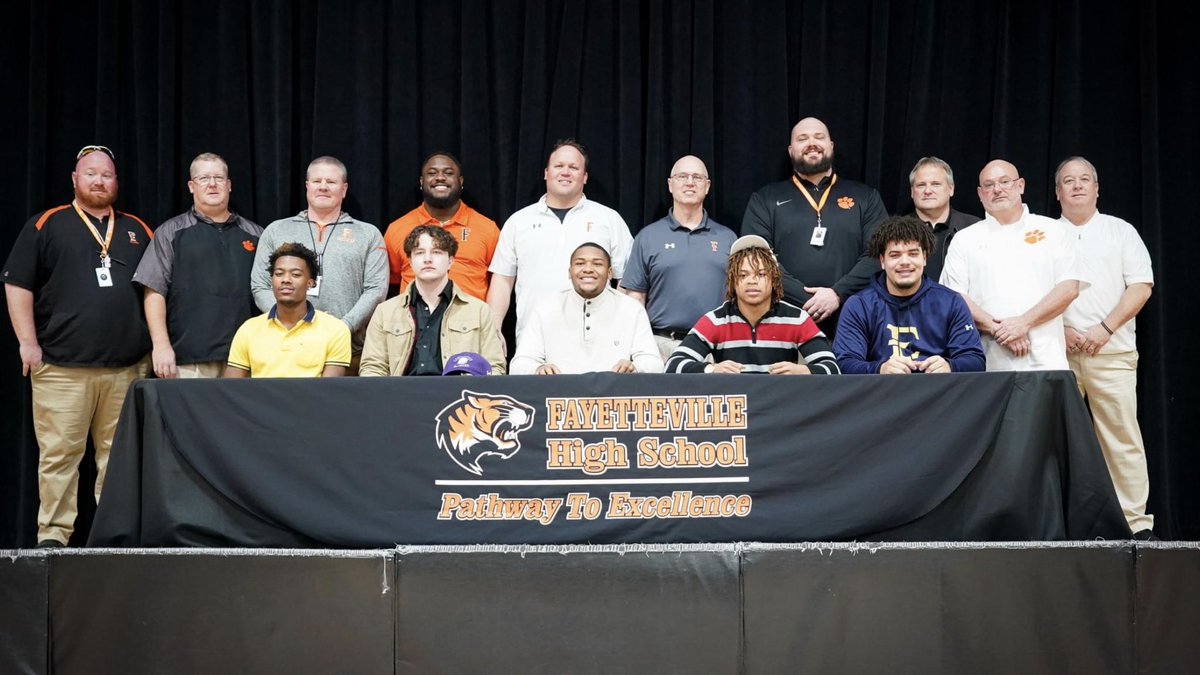 DCJ_15's tweet photo. Awesome day on Tiger Hill as we signed 5 seniors to scholarships. Their freshmen class started with 9 kids and signing 5 to scholarships from a school with 385 students is pretty remarkable. They bought into a blue collar, mentally tough environment. #PainCity @Recruit_theFAY https://t.co/ggX7Zm2quo