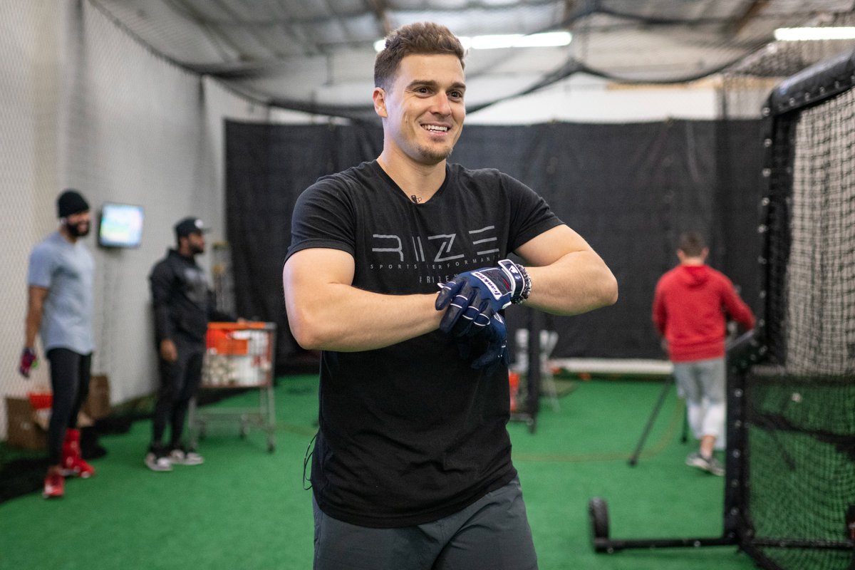 Kiké Hernández of the Boston Red Sox smiles in the cage during an offseason workout at Driveline Baseball in Scottsdale, Arizona 