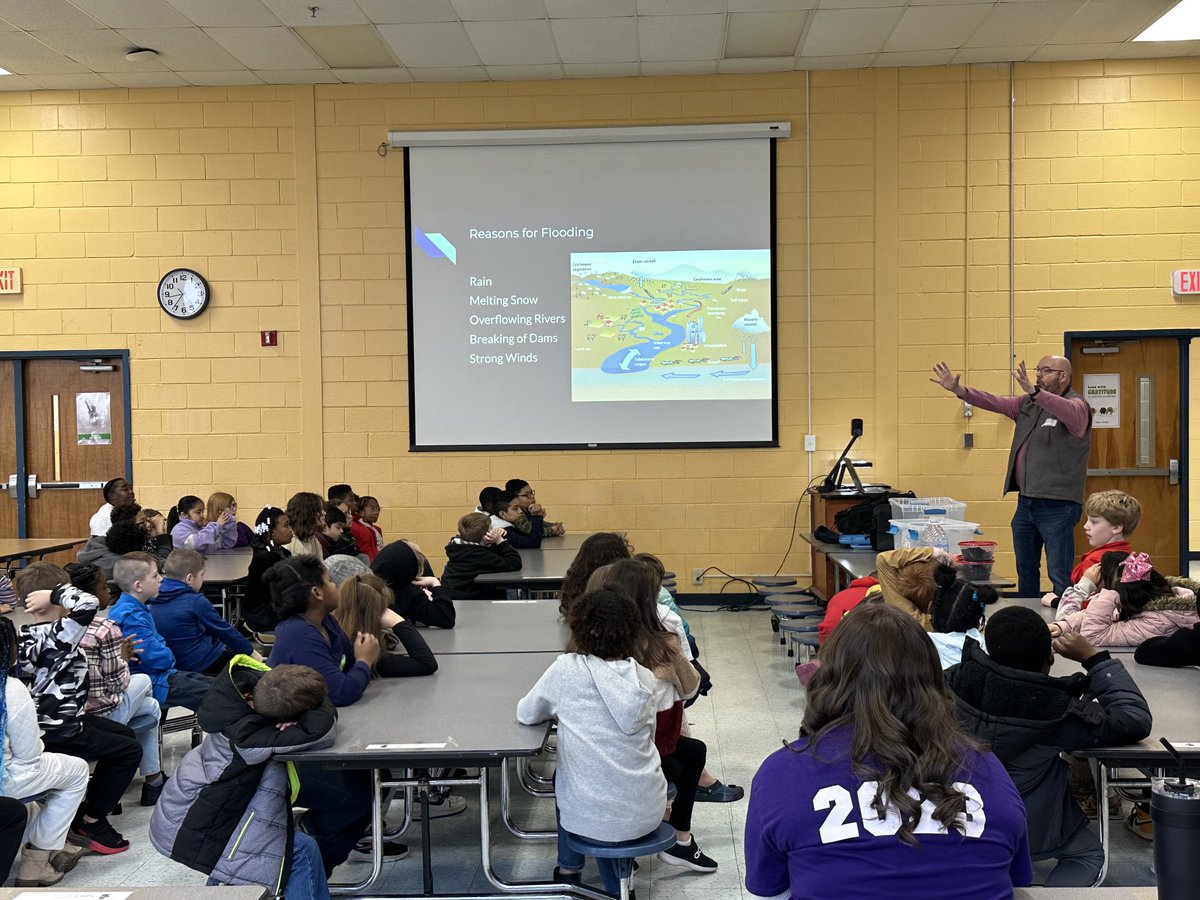 APSUCoSTEM's tweet photo. Faculty/Staff Spotlight: Dr. Mike Wilson, director of @apsugiscenter, inspired our future STEM leaders by presenting on weather and flooding to 90 3rd-graders at Moore Magnet. Learn more about Dr. Wilson and the GIS Center at https://t.co/qIAIZJUR30. #ExperienceSTEM @cmcssinfo https://t.co/Gb7R9Zo88Y