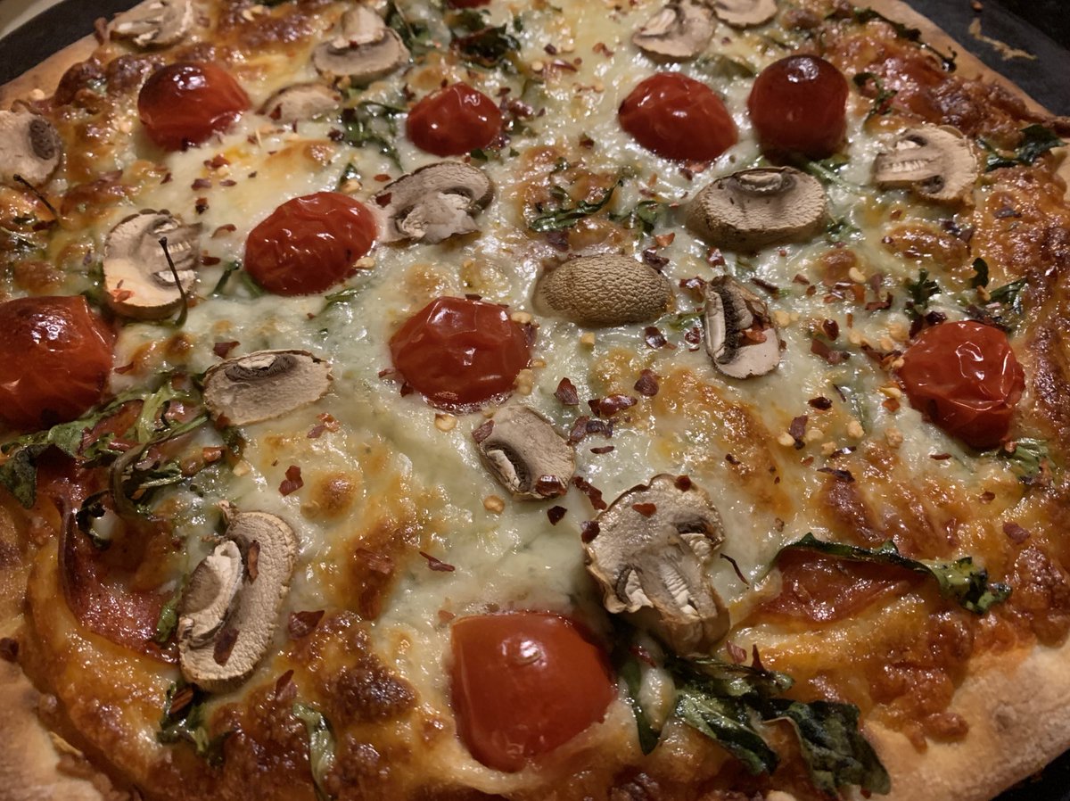 wendywyant's tweet photo. Pizza with salami, mushrooms and rocket https://t.co/eMTSCmk9I0