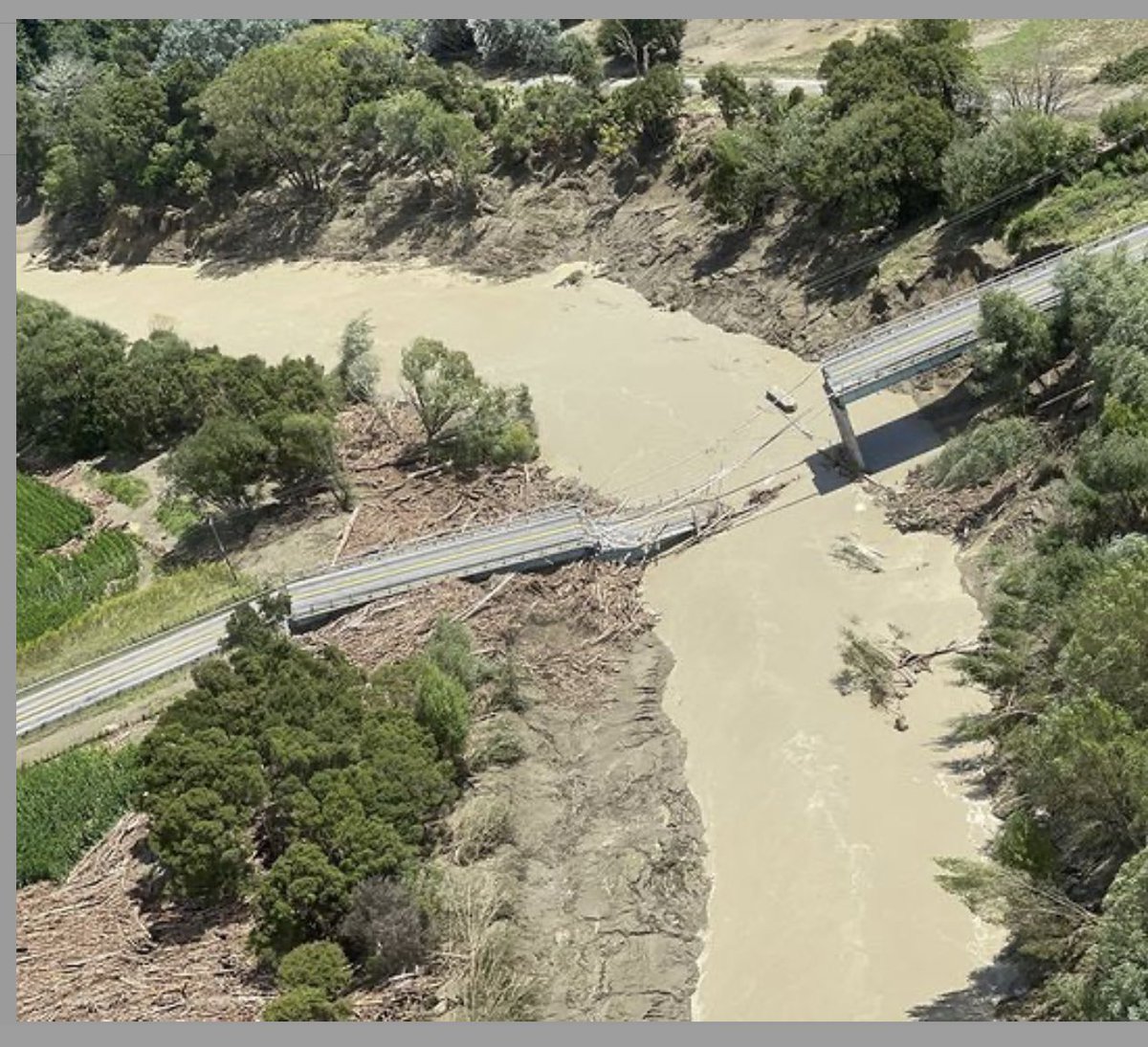 Bridgetpee's tweet photo. The side of the bridge that’s collapsed is where the slash has pushed through. There must be a solution to this problem, it’s costing this country a fortune. Photos @KiriAllan https://t.co/KcjIuqIIls