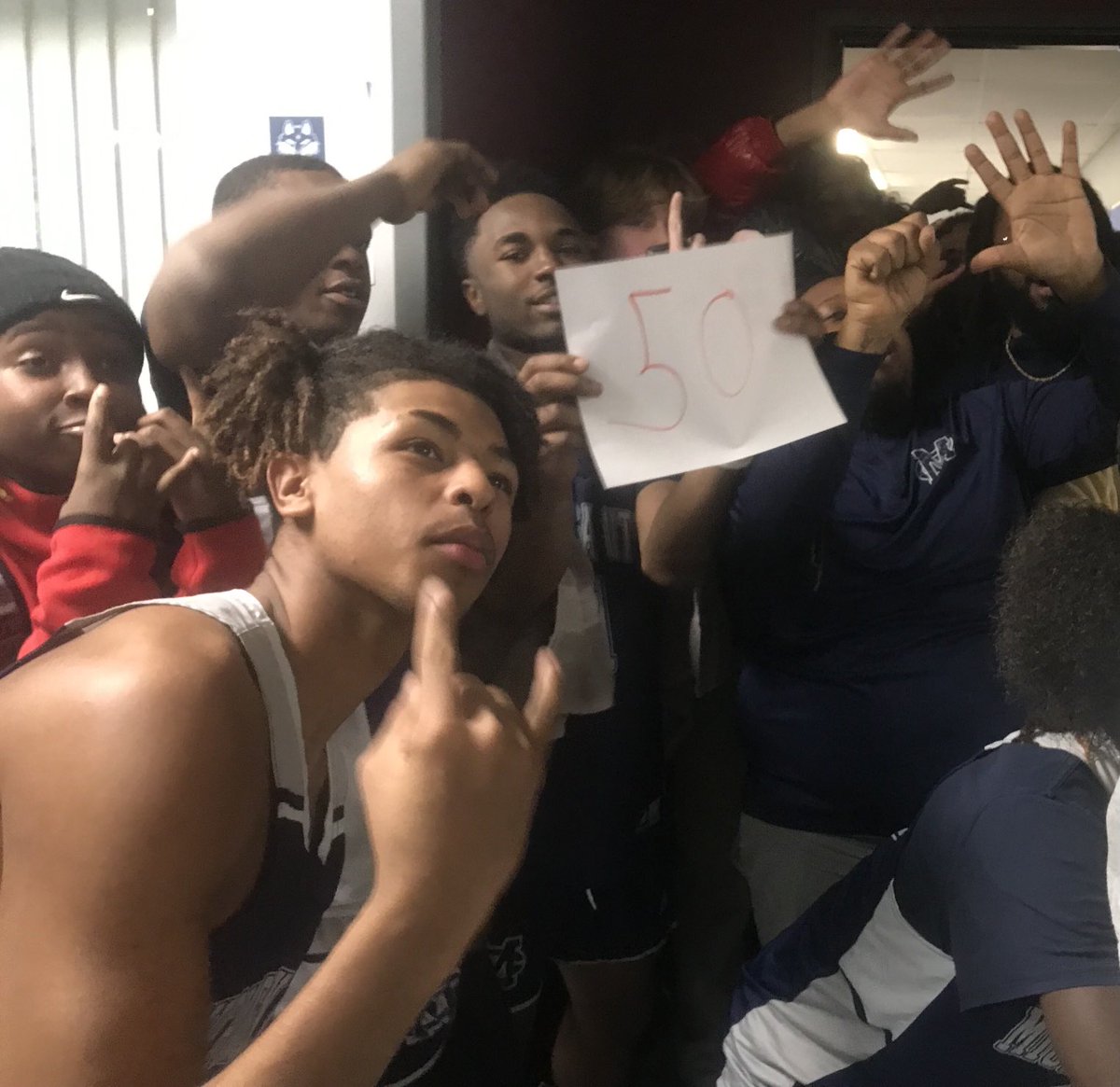 Michigan city players celebrate Jamie Hodges’ 50 ball