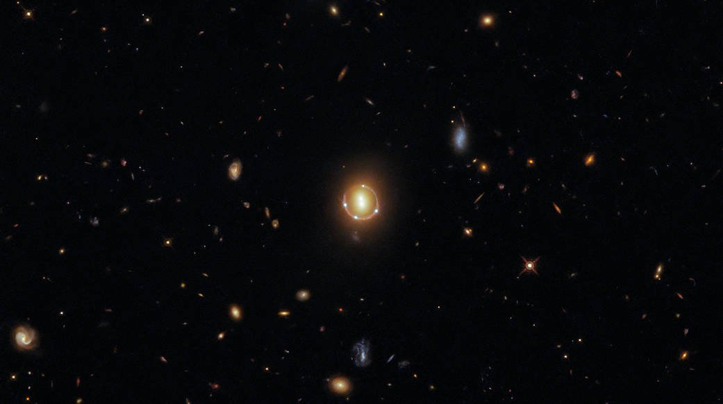 kmshariat's tweet photo. Oh my my! this image  of Cosmic Quintuple makes me feel numb. These four dots (actually five, the fifth is at the centre with two more dots.) are created from a single Quasar. This effect is known as Gravitational Lensing. Currently working on that. https://t.co/6Msh6odWaQ
