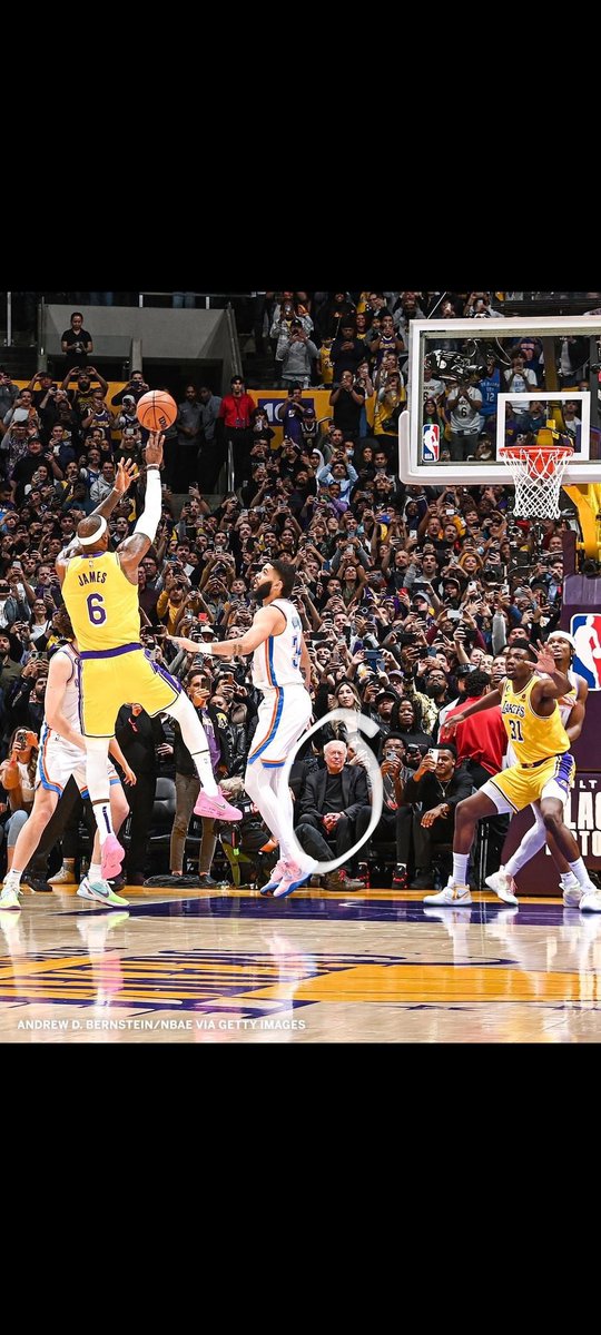 You ever wanted a photo to sum up living in the moment. It's Nike founder Phil Knight, courtside for LeBron's record breaking moment. Zoom in. Not one person using their eyes but him. Incredible