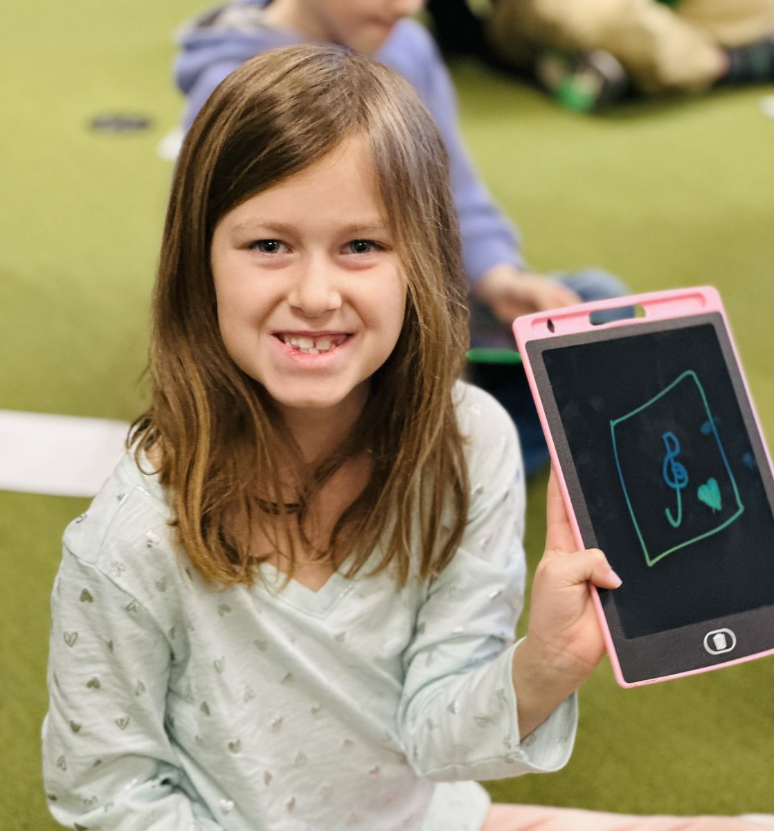 MusicLOK5's tweet photo. Having fun learning how to draw a treble clef with our new LED tablets today! @StadiumDriveLO https://t.co/fqChmoAzyc